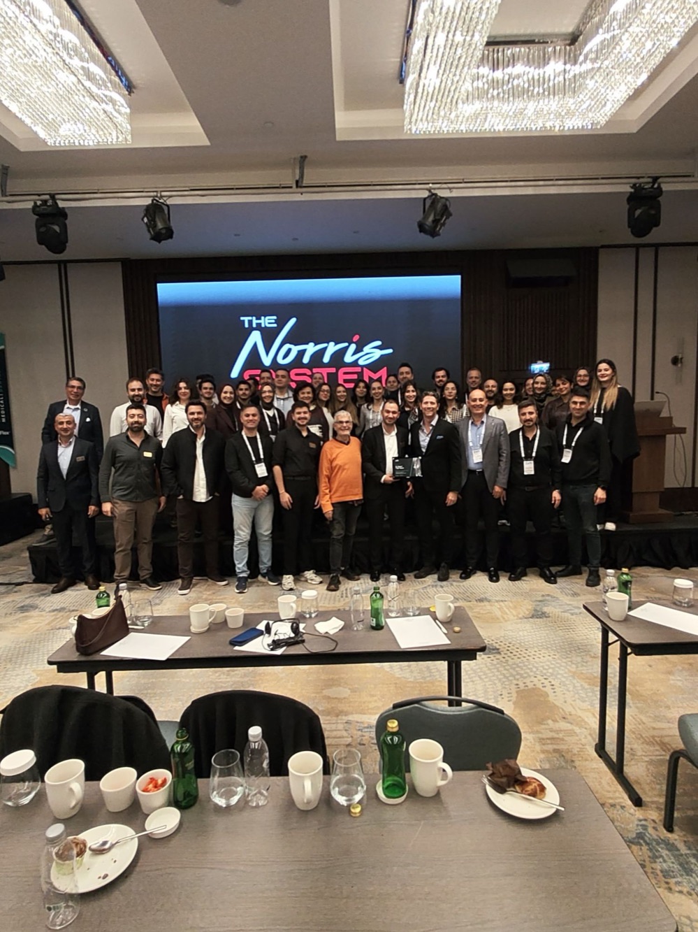 Norris Course participants in a group photo with Dr. Tito Norris